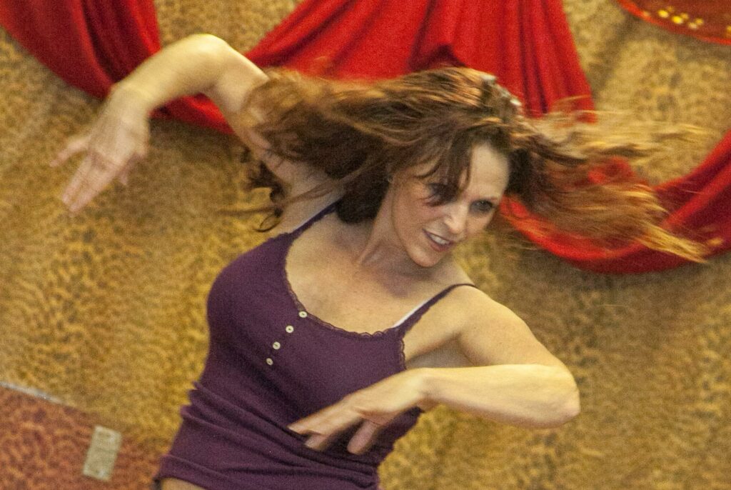 File:Kimber dancing like a woman possessed (8015906359).jpg - a woman in a purple dress is dancing