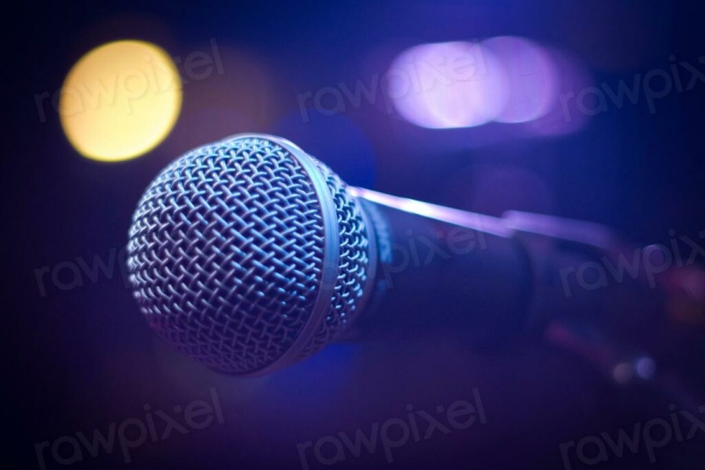 Free microphone image - a microphone with a blurry background