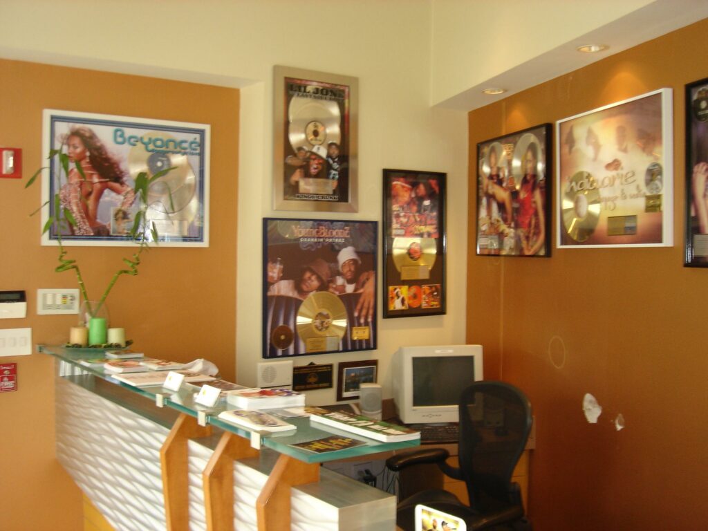 File:Information desk with Industry Plaques, PatchWerk Recording Studios, 2007.jpg - a desk with a c