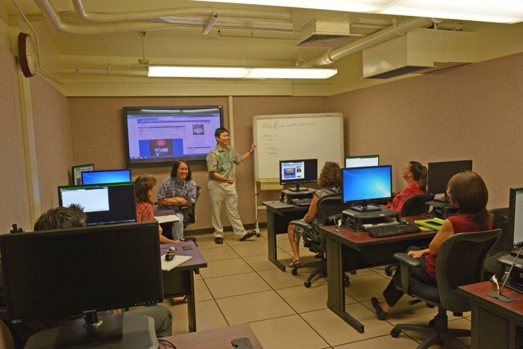 File:Introductory to NAVFAC Portal Training (35234329380).jpg - a group of people sitting at desks i