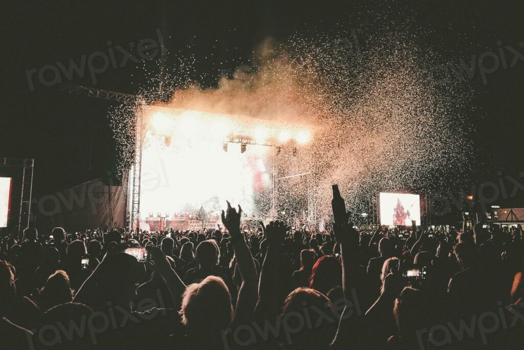 Free concert image - a crowd at a concert with confex