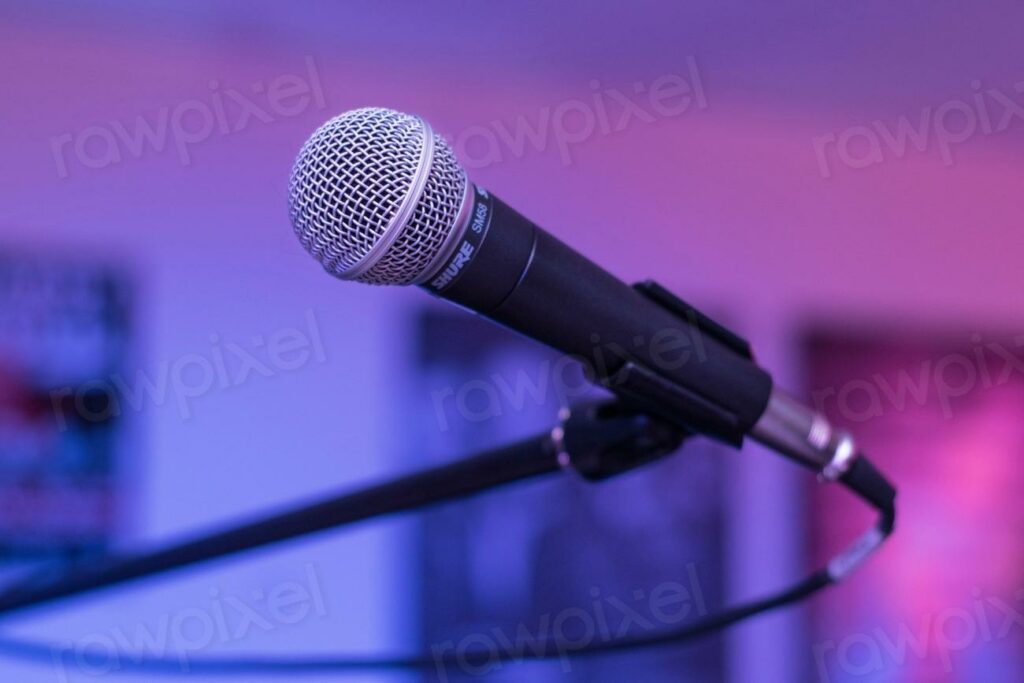 Free microphone image - microphone on stage with blurry background