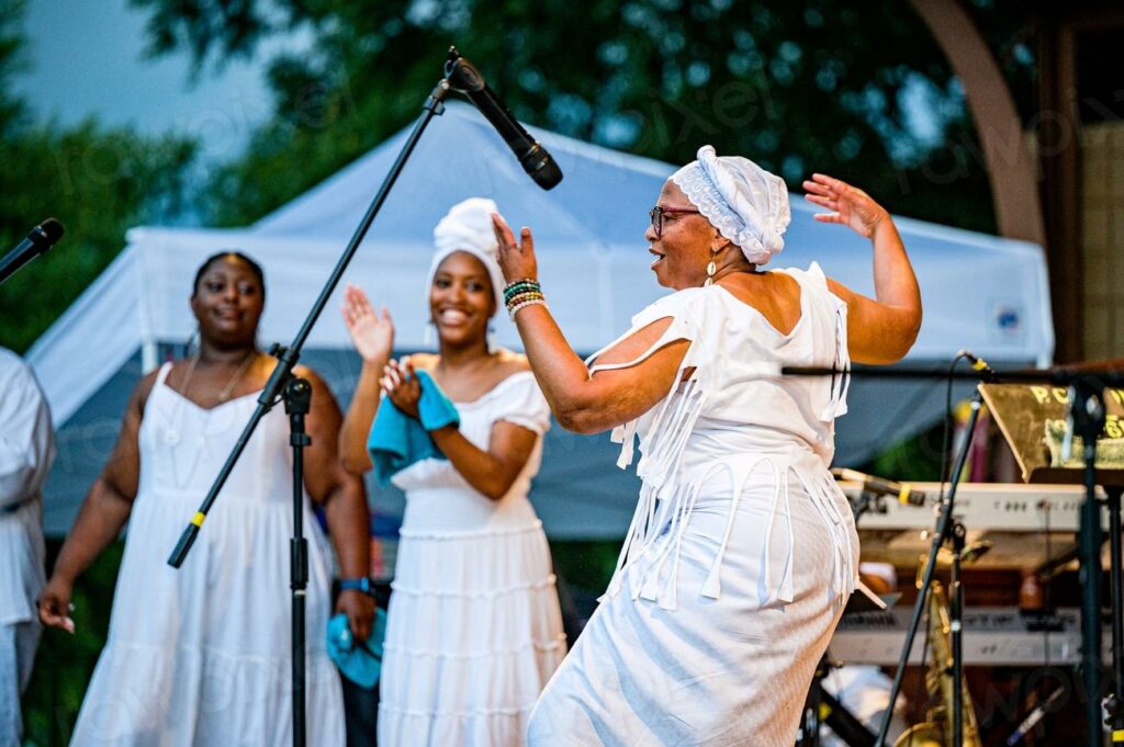 Greenville Grooves, June 17, 2022 - a woman in a white dress